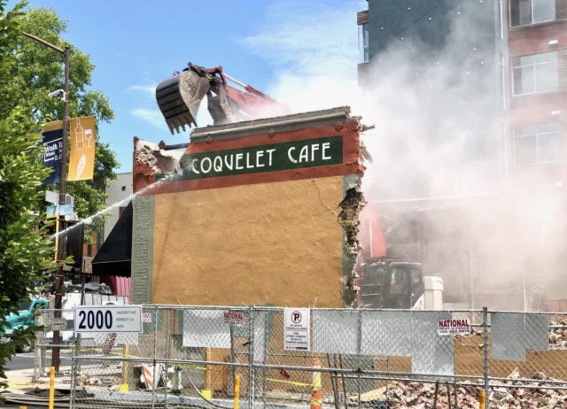 Demolition of Au Coquelet Cafe